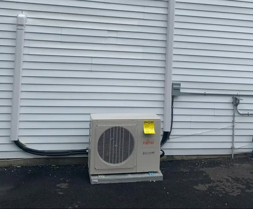 Pristine Air Heating and Cooling technician performing residential HVAC service